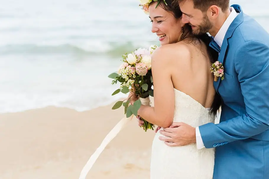 Couple on the beach on honeymoon in Australia